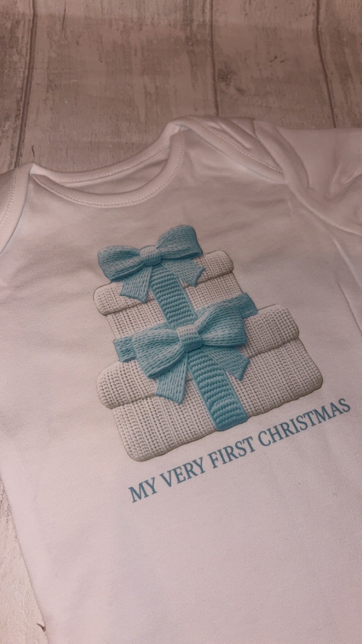 First Christmas Blue Knitted Effect Baby Bodysuit - Short/Long Sleeve